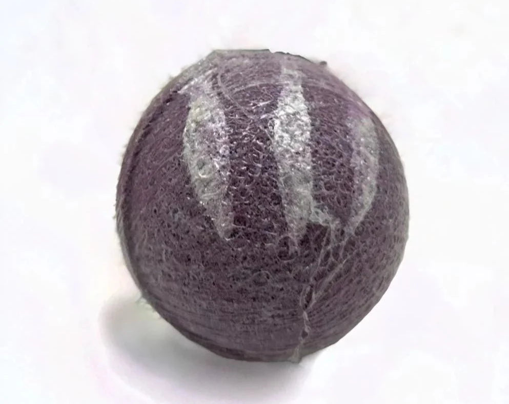 Midnight Jasmine Bath Bomb - MG Bath Products Products Purple colored bath bomb with silver stripes wrapped in plastic.Bath Bomb