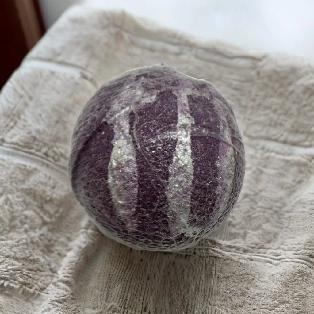 Midnight Jasmine Bath Bomb - MG Bath Products Purple colored bath bomb with silver stripes wrapped in plastic.Bath Bomb